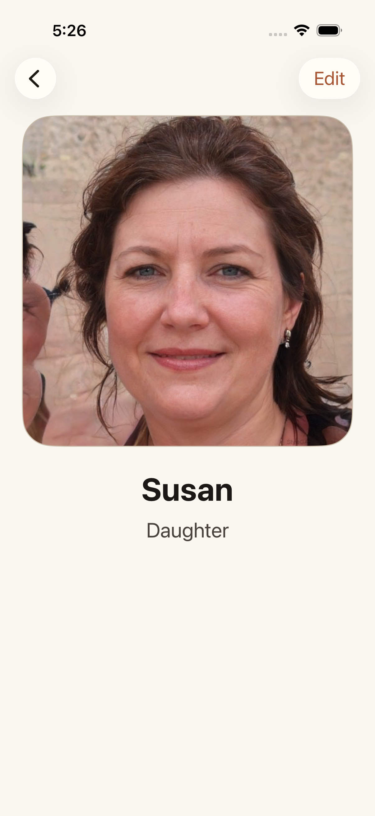 A person's screen in Our People: a large photo of Susan filling the top of the screen, with her name and "Daughter" in big letters underneath.
